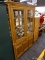 (R3) OAK CHINA CABINET; WOODEN CHINA CABINET WITH 2 PANELED GLASS DOORS THAT HAVE BRASS HANDLES THAT