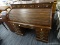 (R4) PINE ROLL TOP DESK; VINTAGE PINE ROLL TOP DESK. TOP HAS 3 DOUBLE DRAWERS WITH WHITE KNOBS,