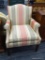 CAMELBACK ARMCHAIR; ARMCHAIR WITH A RAINBOW POLYESTER FABRIC AND 4 BRACKET DETAILED BLOCK FEET WITH