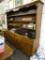 (R1) WOODEN HUTCH; 2 PC. LONG WOOD GRAIN HUTCH WITH 3 SHELVES ON THE TOP PIECE WITH A HARDWOOD