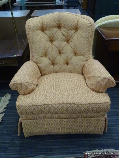 ACCENT CHAIR; ACCENT ARMCHAIR ON A SWIVEL WITH AN ORANGE AND PEACH FLORAL DETAILED FABRIC AND ARM