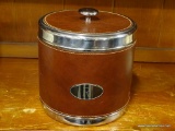 (R1) LEATHER ICE BUCKET; METAL ICE BUCKET AND LID WITH LEATHER WRAPPING AROUND THE SIDE AND TOP AND