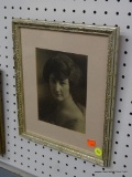 (R1) FRAMED PRINT OF A WOMAN; FRAMED PRINT OF A WOMAN FROM THE EARLY 1900'S. MATTED IN PINK AND