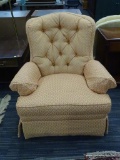 ACCENT CHAIR; ACCENT ARMCHAIR ON A SWIVEL WITH AN ORANGE AND PEACH FLORAL DETAILED FABRIC AND ARM