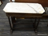 (R4) MARBLE TOP END TABLE; WHITE MARBLE TOP END TABLE WITH A DETAILED WOODEN BASE WITH RIBBON AND