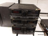 (R6) FISHER COMPACT HOME THEATER SYSTEM; FEATURES A CD PLAYER, CASSETTE, TUNER, AND DOUBLE CASSETTE