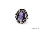 (SHOW) LADIES GERMAN SILVER RING; OVAL SHAPED PURPLE AMETHYST AND GERMAN SILVER RING. SIZE 8.