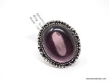 (SHOW) LADIES GERMAN SILVER RING; LARGE OVAL SHAPED PURPLE AMETHYST AND GERMAN SILVER RING. SIZE 7.