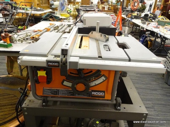 (R2) RIDGID TABLE SAW; RIGID 10 IN TABLE SAW WITH 5,000 RPM, 120V ~ 60 HZ, AND 15 AMPS. ITEM R4517.