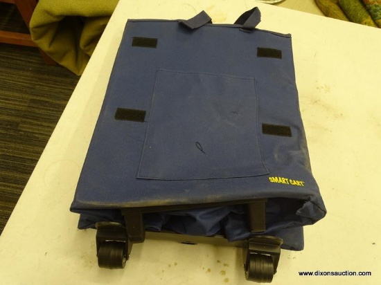 DBEST SMART CART; BLUE FABRIC SMART CART WITH ROLLING WHEELS AND ERGONOMIC HANDLE. MEASURES 1 FT X 3