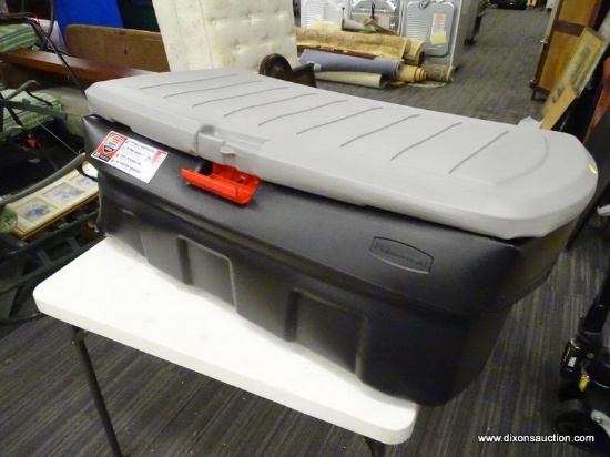 RUBBERMAID ACTIONPACKER; RUBBERMAID ROUGHNECK 48 GALLON ACTION PACKER WITH LOCKABLE LATCH. HAS MAJOR