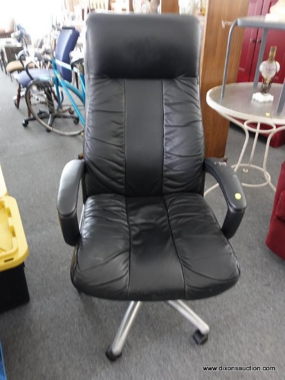 (R4) OFFICE CHAIR; FAUX BLACK LEATHER OFFICE CHAIR. HAS MINOR WEAR. MEASURES 26 IN X 26 IN X 50 IN.