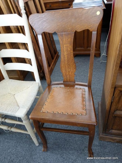 (R5) ANTIQUE CHAIR; ANTIQUE OAK CHAIR WITH CLAW FEET. REFINISHED. MEASURES 18 IN X 16 IN X 40 IN.