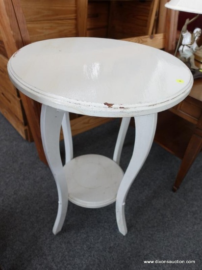 (R5) TABLE; WHITE PAINTED LAMP TABLE. MEASURES 28 IN TALL WITH A 20 IN DIAMETER.