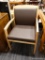 (R2) WAITING ROOM CHAIR; WOODEN WAITING ROOM ARM CHAIR WITH A BROWNISH BURGUNDY LEATHER CUSHIONED