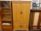 (R2) ENTERTAINMENT ARMOIRE; FAUX WOODEN ENTERTAINMENT ARMOIRE WITH 2 LARGE CABINET DOORS LEADING TO