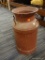 (R3) VINTAGE MILK CAN; RED VINTAGE MILK CAN/DRUM WITHOUT THE LID. HAS 2 HANDLES AND SHOWS SIGNS OF