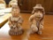 (R3) CLAY POTTERY STATUES; A PAIR OF CLAY POTTERY ART STATUES OF A MAN AND WOMAN RUSSIAN FARMER.