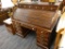(R3) PINE ROLL TOP DESK; VINTAGE PINE ROLL TOP DESK. TOP HAS 3 DOUBLE DRAWERS WITH WHITE KNOBS,