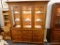 (R1) CHINA CABINET; 2 PIECE CHINA CABINET. TOP PIECE HAS 3 FRONT GLASS DOORS THAT OPEN TO REVEAL 2