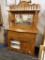 (R4) ANTIQUE OAK DRESSER; HAS ACANTHUS LEAF CARVED ACCENTED GALLERY TOP WITH BACK MIRROR AND DUAL