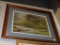 (WALL) FRAMED LANDSCAPE PRINT; THIS PIECE LOOKS TO BE A COPY OF A WATERCOLOR SHOWING A LAKE AND A