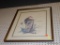 (WALL) FRAMED PRINT; DEPICTS A WOODPECKER SITTING ON A WOODEN BLOCK WITH A BUG IN ITS MOUTH. HAS