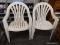 (R5) PATIO ARM CHAIRS; PAIR OF WHITE HEAVY DUTY PLASTIC ARM CHAIRS WITH ROUNDED BACKS. MEASURES 2 FT