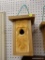 (R1) BIRD HOUSE; HANDMADE BIRD HOUSE WITH A CARVED OLD BEARDED MAN WITH A HOLE ENTRY ON HIS MOUTH.