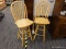 (R6) BAR CHAIRS; PAIR OF WOODEN BAR CHAIRS ON A SWIVEL WITH A BANNISTER BACK AND 2 BOX STRETCHERS