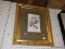 (R6) FRAMED PRINT; DEPICTS A PINK ROSE WITH INSECTS AROUND IT. MATTED IN GREEN AND FRAMED IN AN