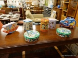 (R2) LOT OF DECORATIVE TINS; 7 PIECE LOT OF TINS OF DIFFERENT SHAPES AND SIZES TO INCLUDE A M&M'S