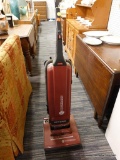 (R2) VACUUM CLEANER; SINGER 8.0 POWER AMP VACUUM CLEANER. IS RED AND BLACK IN COLOR. HAS NOT BEEN