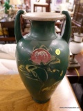 (R2) VASE; LARGE GREEN SATSUMA VASE WITH FLOWERS PAINTED ONTO THE FRONT (MEASURES 18 IN TALL).