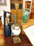 (R2) TABLE LAMP; METAL TROPHY SHAPED TABLE LAMP WITH WHITE PORCELAIN IN THE MIDDLE. HAS NO LAMP