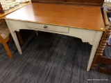 (R3) WOODEN DESK; LARGE WOOD GRAIN DESK WITH A WOODEN TABLE TOP AND A WHITE PAINTED DESK BELOW IT.