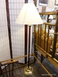 (R4) FLOOR LAMP; RED MARBLED STEM SITTING ON A BRASS BASE. HAS A SWINGING ARM LIGHT FIXTURE WITH A