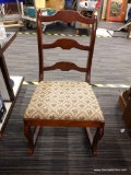 (R4) ROCKING CHAIR; WOODEN LADDER BACK ROCKING CHAIR WITH A BEIGE FLORAL UPHOLSTERED FABRIC.