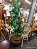 (R4) DECORATIVE PLANT; LARGE DECORATIVE FAUX PLANT WITH LARGE WATERMELON LIKE LEAVES. COMES IN A