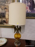 (R1) EAGLE LAMP; WOODEN LAMP WITH BRASS EAGLE BODY AND CLOTH SHADE WITH FINIAL. IS IN EXCELLENT
