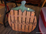 (R5) WELCOME PUMPKIN; STANDING, PANELED, PUMPKIN SHAPED WELCOME SIGN. MEASURES 18 IN X 20.5 IN.