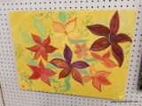 (R6) PAINTING ON CANVAS; FLOWER PAINTING ON A YELLOW CANVAS. MEASURES 2 FT X 18 IN.