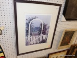 (R6) FRAMED PHOTO; PHOTO DEPICTS A WHITE GARDEN GATE ARCHWAY WITH A BRICK WALKWAY THAT LEADS TO THE