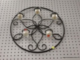 (R6) DECORATIVE CANDLE HOLDER; BLACK METAL CANDLE HOLDER WITH 5 RINGS FOR VOTIVE CANDLES. HAS A