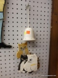 DECORATIVE CERAMIC CAT BELL; WHITE CERAMIC BELL WITH VARIOUS DIFFERENT CAT CHIMES. DOES HAVE SOME