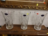 (R1) CRYSTAL GLASS VASES; 3 PIECE LOT OF DEPLOMB LEADED LARGE CRYSTAL VASES. MEASURES 11 IN TALL.