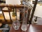 (R2) LOT OF GLASS VASES; 2 PIECE LOT OF GLASS VASES OF DIFFERENT SIZES WITH A CROSSING SWIRL DESIGN.