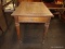 (R2) END TABLE; WOODEN END TABLE WITH A FAUX TOP DRAWER WITH RIBBON SWIRL DETAILING BELOW IT, SITS