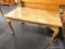 (R3) COFFEE TABLE; WOODEN COFFEE TABLE WITH 4 QUEEN ANNE LEGS. MEASURES 3 FT X 20 IN X 18 IN. NEEDS