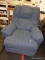 (R3) RECLINING ARM CHAIR; BLUE FABRIC ARMCHAIR THAT HAS A HANDLE FOR RECLINING ON THE RIGHT SIDE.